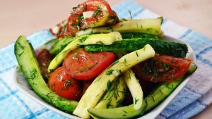 Малосольные огурцы с кабачками и помидорами