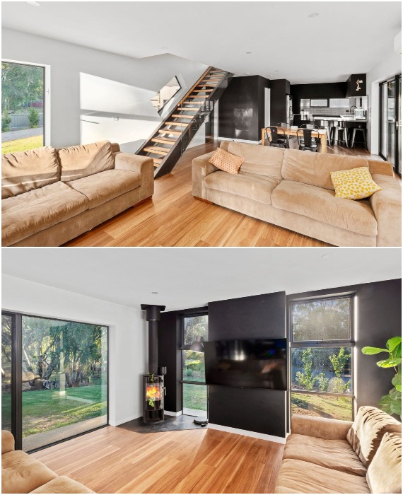 Стильная и светлая гостиная расположена прямо у входа. | Фото: realestate.com.au.