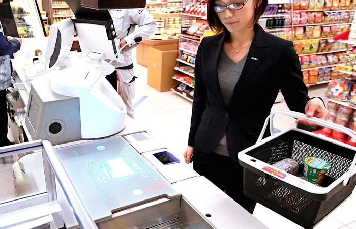 Продукты упаковывают не на кассе, а в специальном месте. / Фото: finance.yahoo.com Продукты упаковывают не на кассе, а в специальном месте. / Фото: finance.yahoo.com