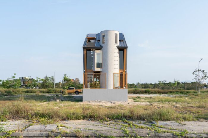 Стороны фасада дома-офиса Ga.o House имеют различную форму и оформление. | Фото: futuroprossimo.it. Стороны фасада дома-офиса Ga.o House имеют различную форму и оформление. | Фото: futuroprossimo.it.